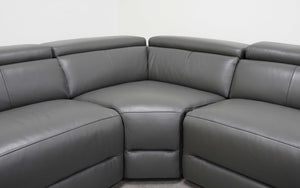 Mirage Reclining Sectional With Adjustable Headrest